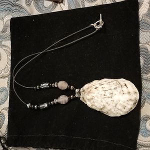 Necklace shell